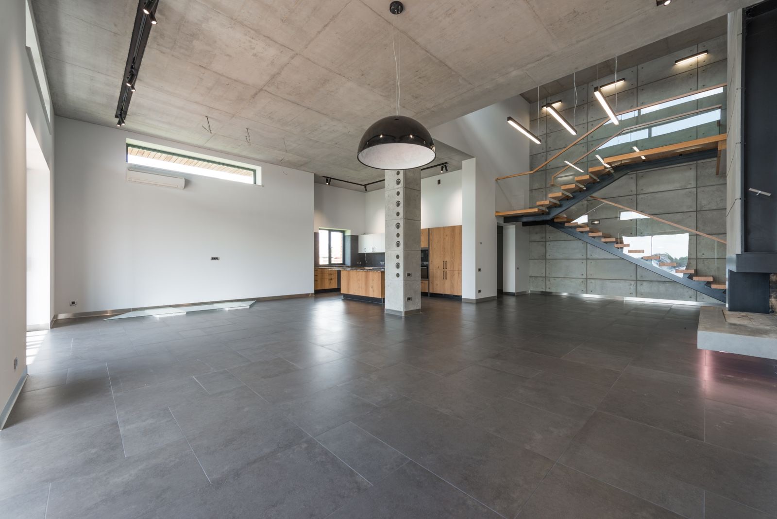 Warehouse-style space with a polished concrete floor