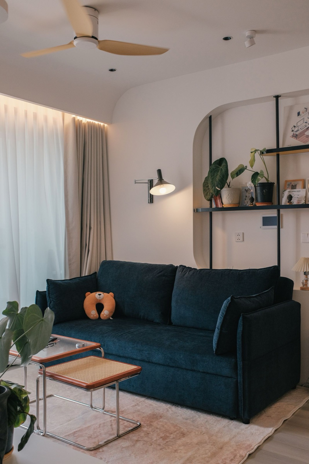 Furnished living room with warm hardwood floors