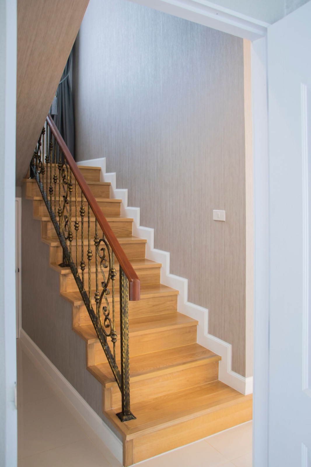 Modern staircase with a runner